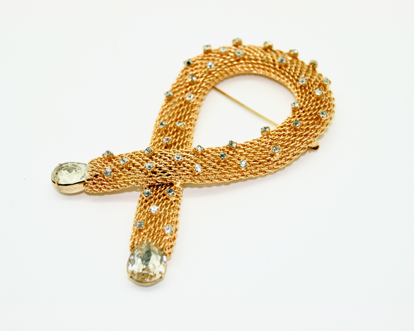 1960's HOBÉ gold plate mesh and crystal loop brooch