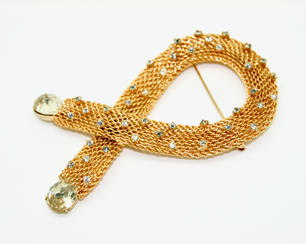 1960's HOBÉ gold plate mesh and crystal loop brooch