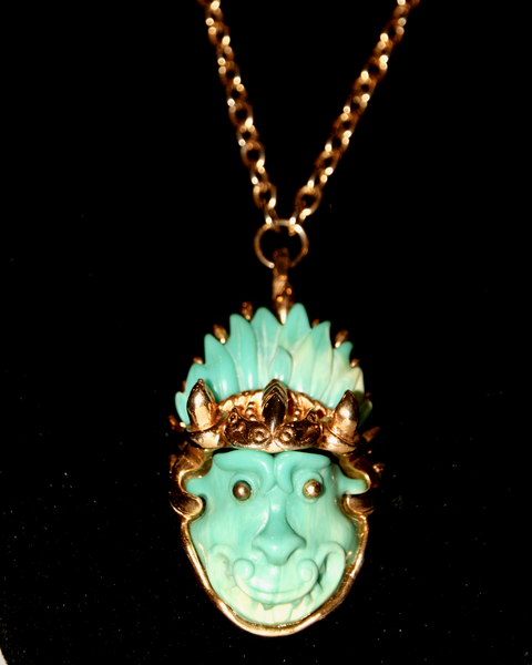 1970's SPHINX green lucite gargoyle face pendant